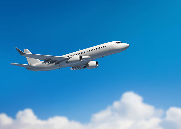 passanger airplane flying above clouds.