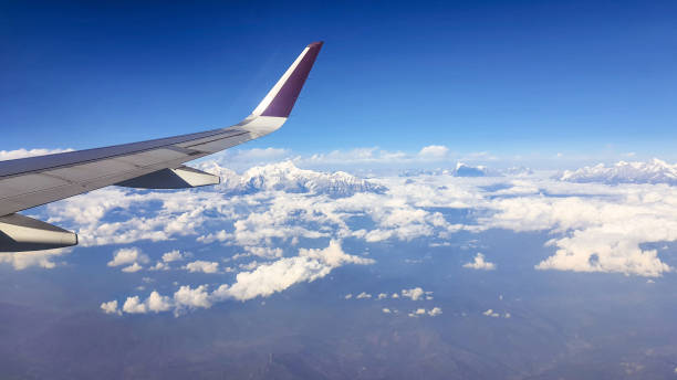 flight over himalayan mountain peaks.